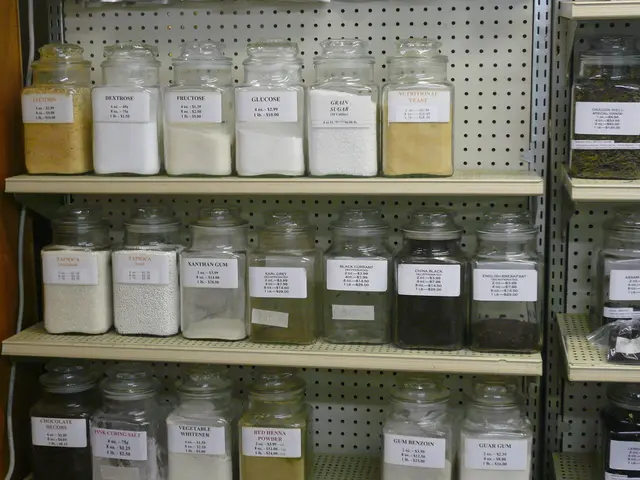 In this image I see many jars in the racks.