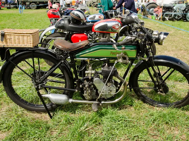 In this picture we can see few vehicles on the grass, and we can find group of people, on the left...