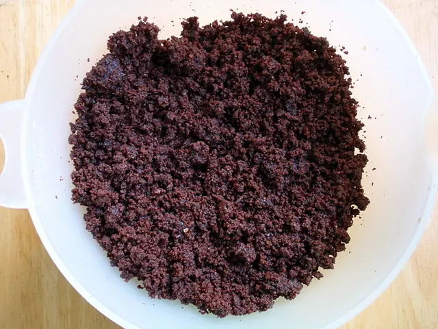 In this image I can see the cream colored surface and on it I can see the white colored bowel and...