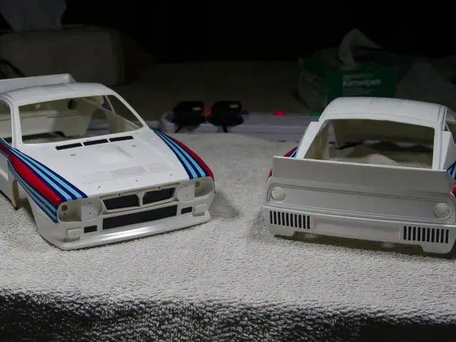 In this picture we can see few toys and a tissue box.