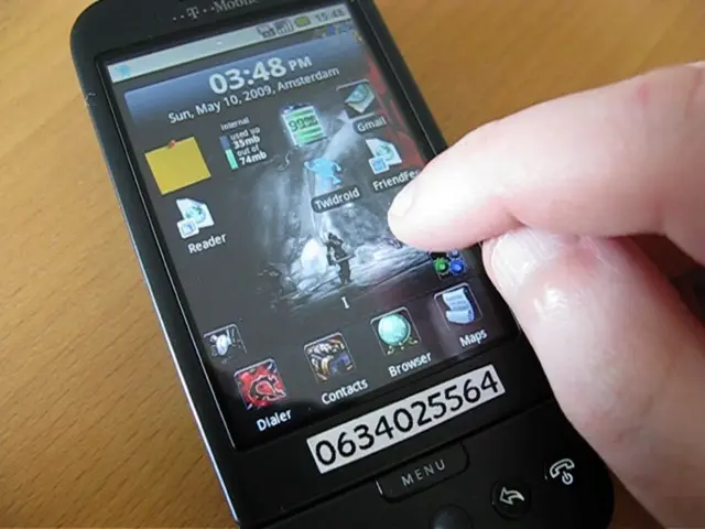 In this image there is person using a mobile phone, on the screen there are few apps and a number...